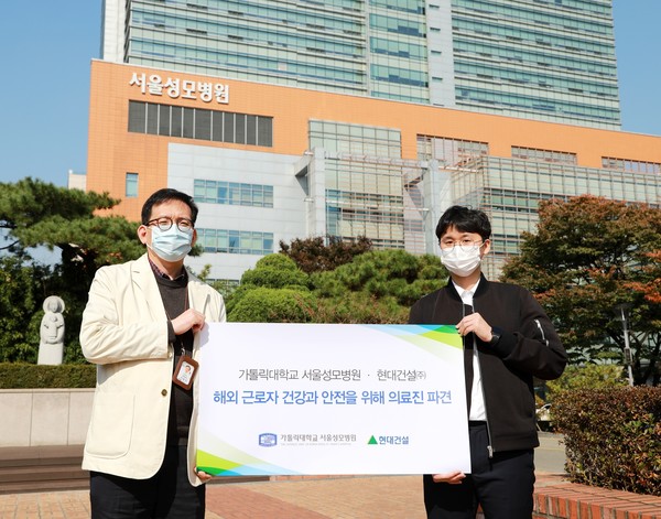  서울성모병원 파견 의료진 사진(왼쪽 서울성모병원 이동건 교수, 오른쪽 강재진 간호사)