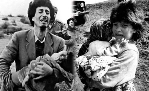 1992년 2월 아제르바인잔 호잘리시에서 한 소녀가 알메니아가 자행한 대학살을 피해 동생을 안고 있다.